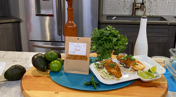 Easy Fish Taco Recipe with taco seasoning mix on kitchen counter spicekick